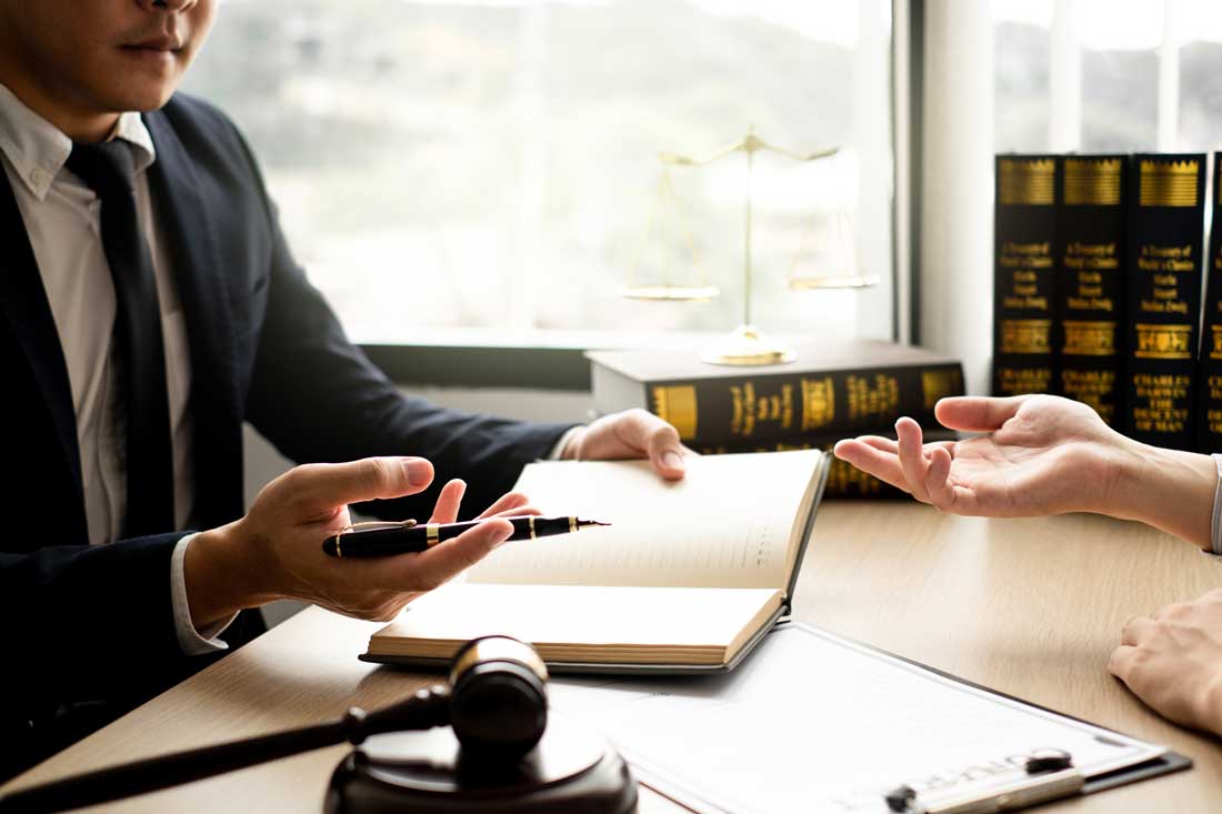 Family law attorney discussing a case with a client in Rio Grande Valley