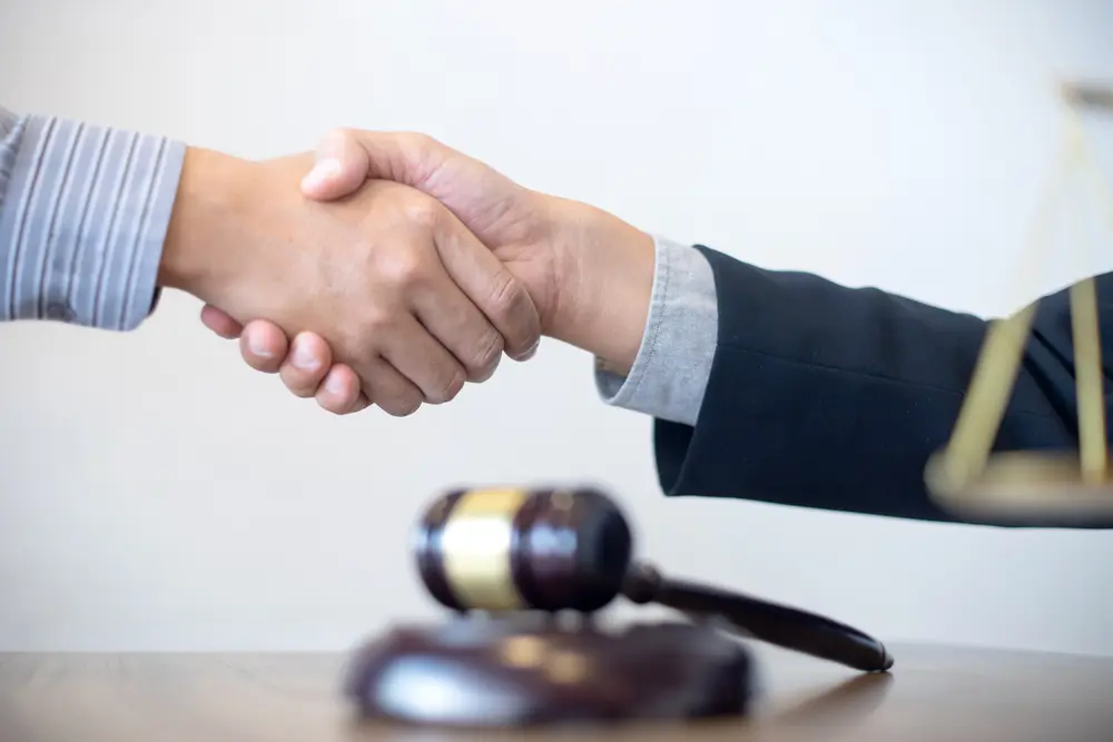 Criminal defense attorney reviewing court charges and legal documents in Pharr, TX